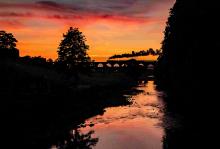  This photograph brings together two of my favourite subjects, a stunning sunset and the magnificent sight of steam engine. British India Line powering over  Whalley Arches. © Diane Muldowney